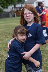 KdVS Friends Two girls with Koolen-de Vries Syndrome hugging